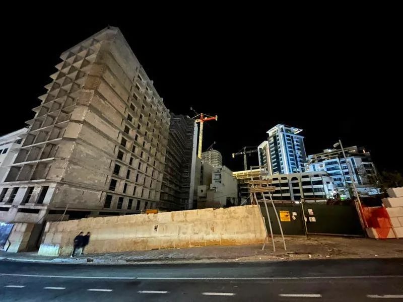 A Maltese construction scene at night