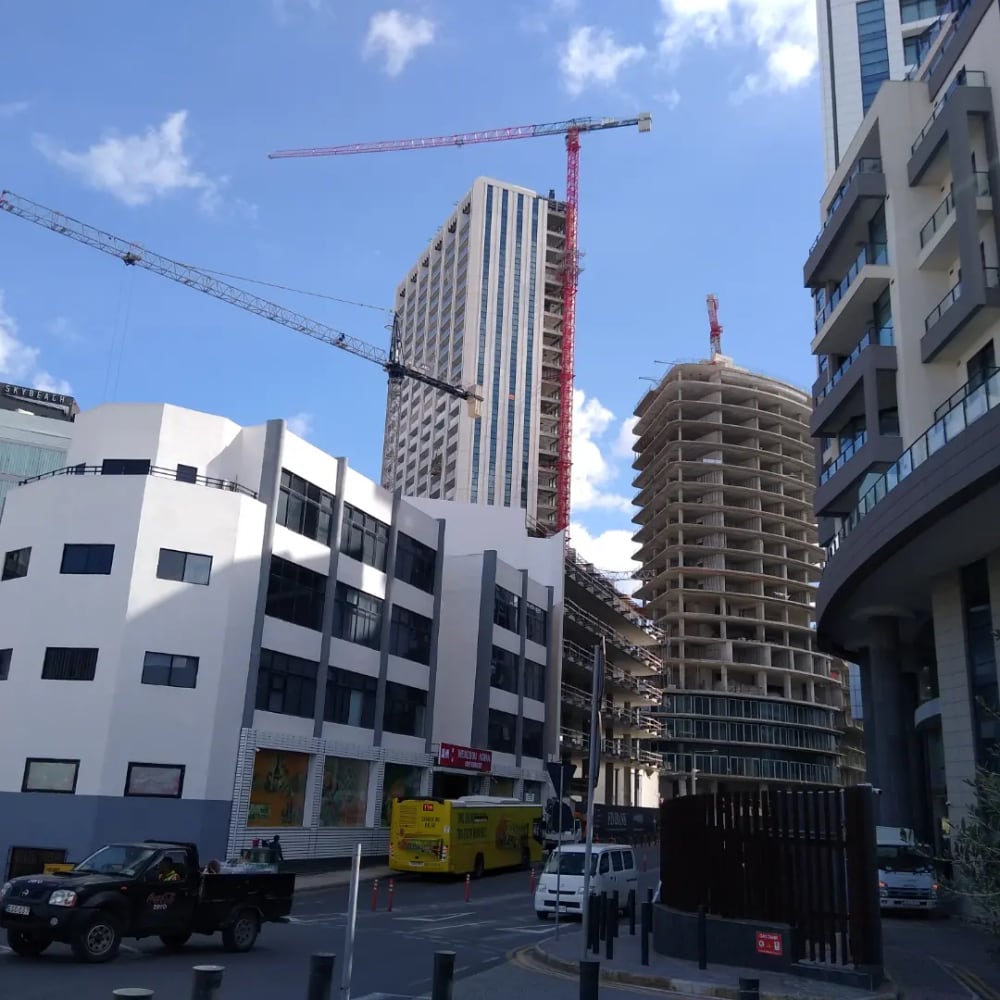 Tower cranes over an urban construction site